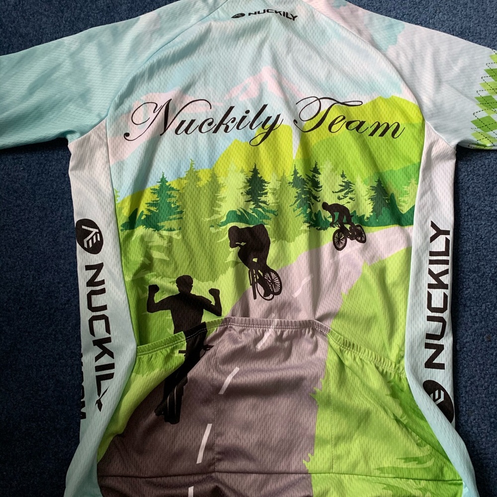 cycle shirt with three pockets size L Like new.